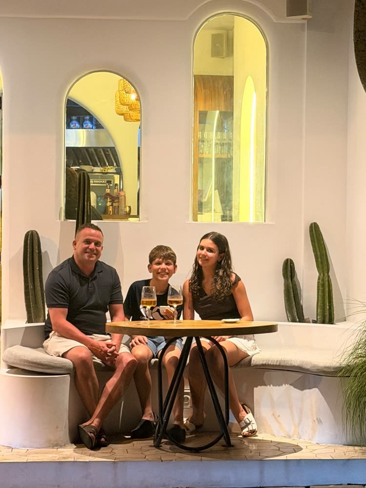 A family at the outside table of Artista Cucina in Canggu