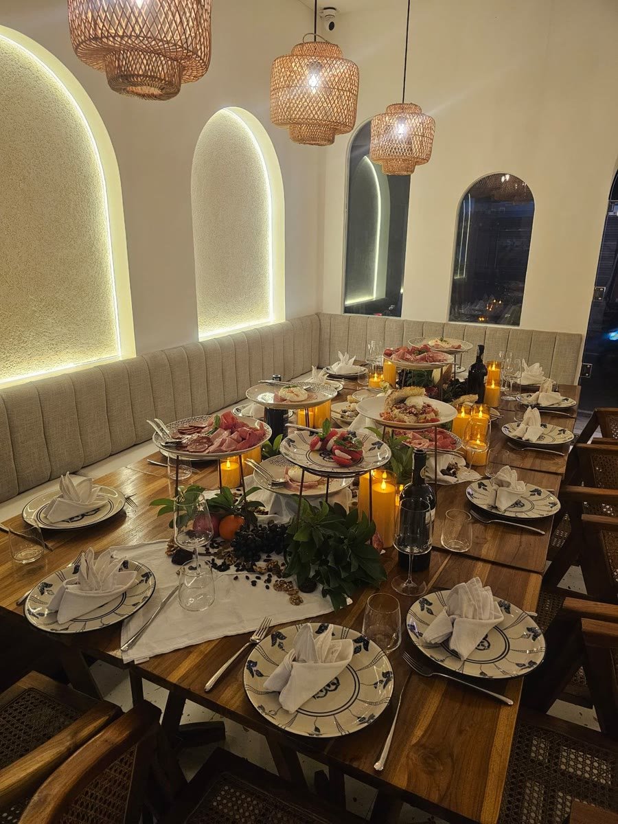 The long table at Artista Cucina, set for a private dinner