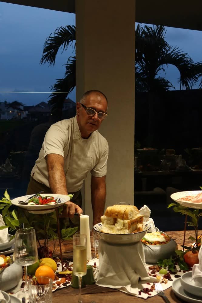 Lucio, the chef of Artista Cucina in Canggu, plating antipasti