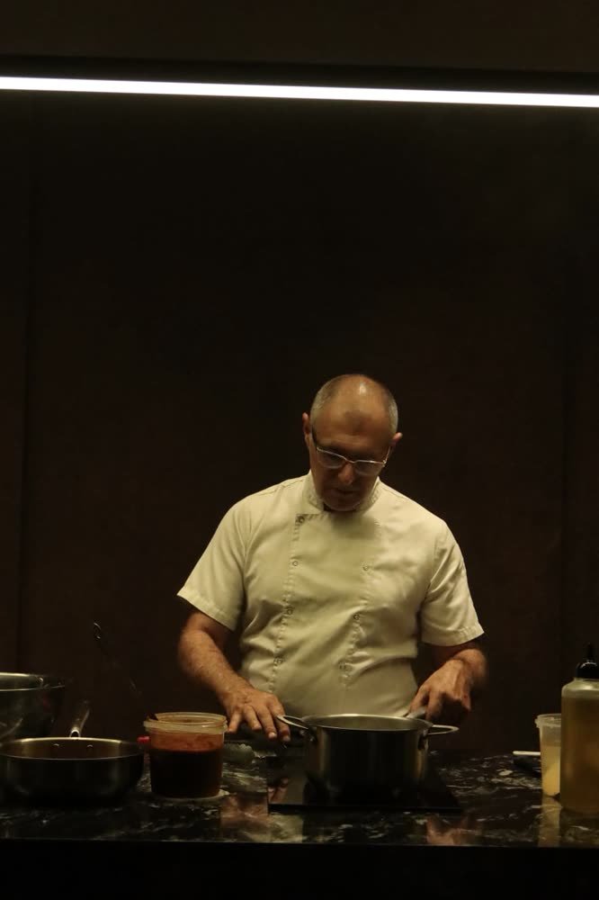 Lucio at the stove