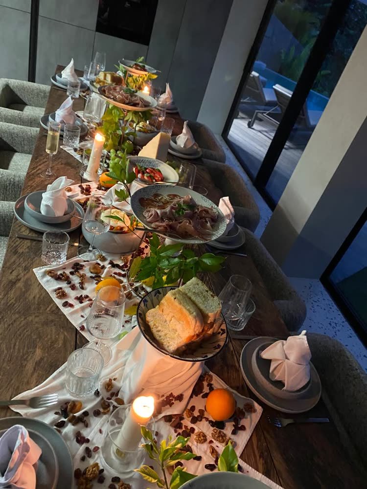 Catering table from above, prosciutto, focaccia, candles