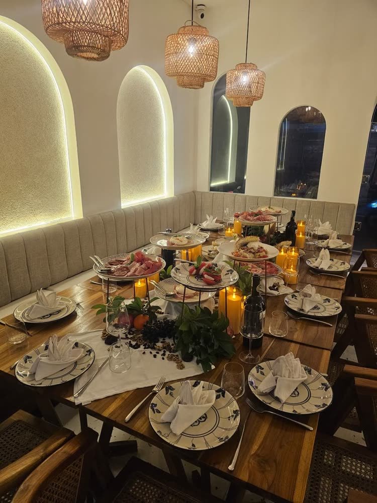 The dining room of Artista Cucina in the evening